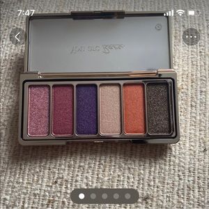 Eyeshadow palette Rare Beauty by Selena Gomez.